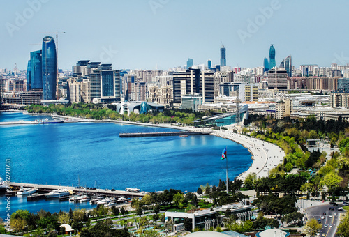 Scenic landscape of skyline Baku with  numerous modern high-rise buildings under construction photo