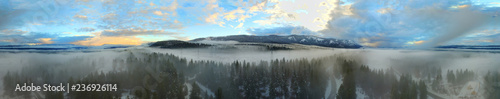 Amazing wide photo from drone above cloud with fog in the forest and sunset and clear sky above. Mountains. Cle Elum, WA state. USA