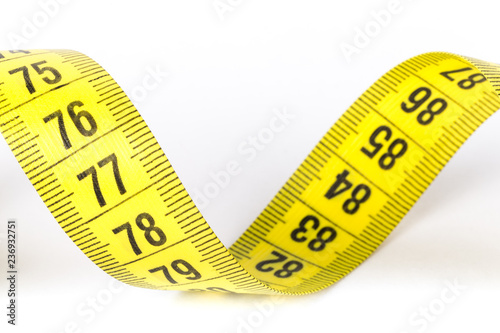 Measuring tape of the tailor for you design. On white background