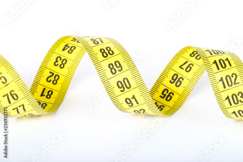 Measuring tape of the tailor for you design. On white background