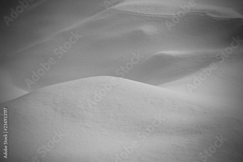 Snowdrift surface like a toy bear muzzle. Selective focus. Shallow depth of field. Toned