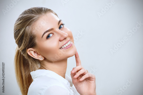 Attractive caucasian smiling woman with blond hair.
