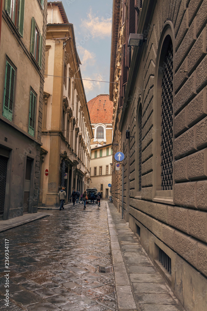 one of the many narrow streets of the old town in Florence