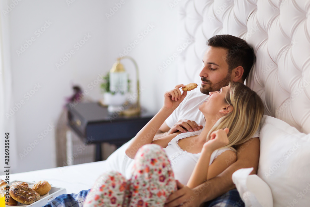 Young couple having having romantic times in bedroom
