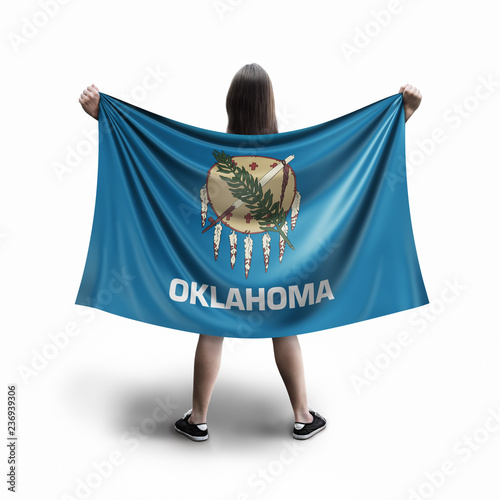 Women and Oklahoma flag