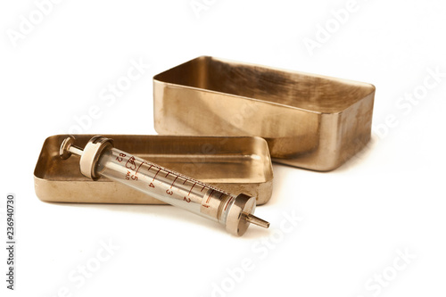Set of old syringe. And iron box