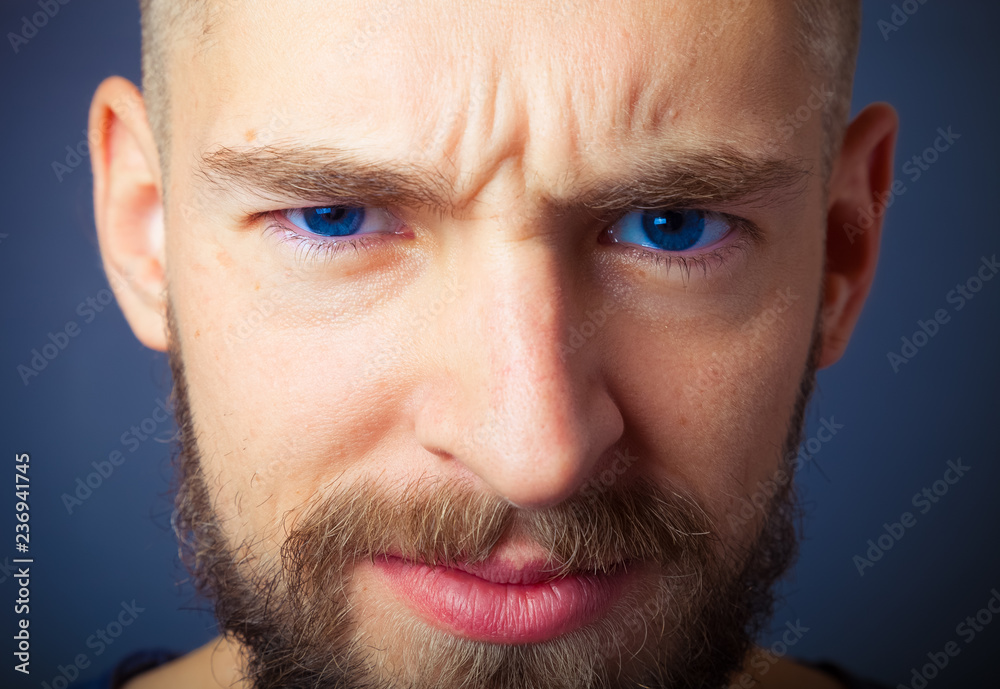 Portrait of a young man with a beard. Toned Portrait of a young man with a beard. Toned