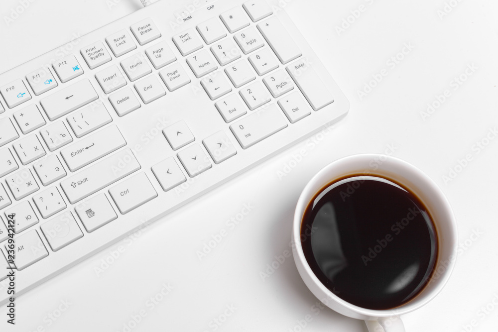 Modern white office desk table with computer keyboard and supplies. Top view with copy space, flat lay. Modern white office desk table with computer keyboard and supplies. Top view with copy space, flat lay.
