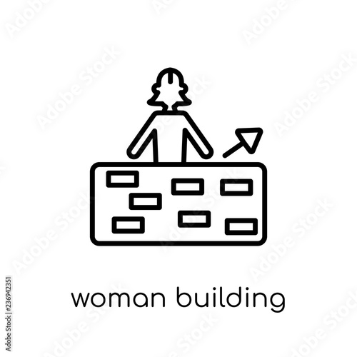 Woman Building a Wall icon. Trendy modern flat linear vector Woman Building a Wall icon on white background from thin line Ladies collection