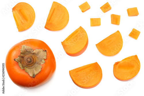 fresh ripe persimmons with slices isolated on white background. top view