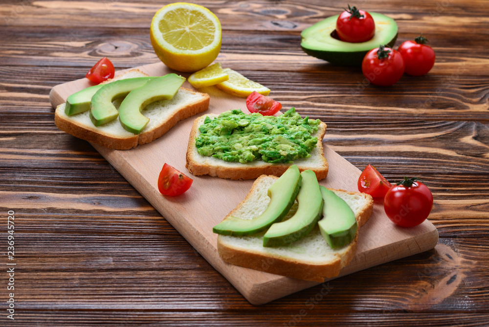 Avocado sandwich on a bread made with fresh sliced avocados from above