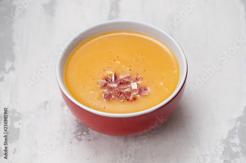 vegetable soup with smoked meat in bowl