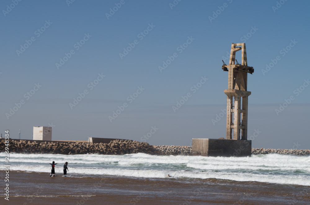 Surfers at the port of Sidi Ifni.