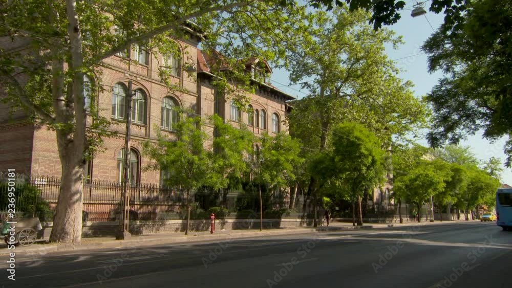 Lockdown: Cars and Buses Drive Down a Sunny Street in Beautiful Budapest Lockdown: Cars and Buses Drive Down a Sunny Street in Beautiful Budapest