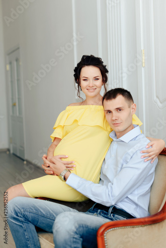 young married couple waiting for a miracle, pregnant wife with her husband