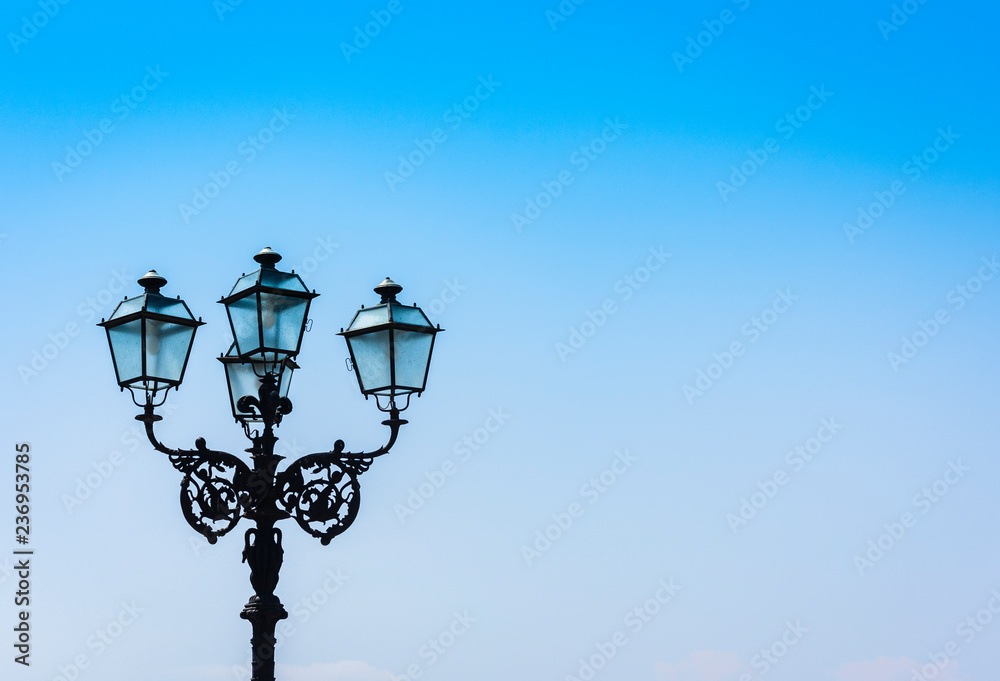 Old street lamppost – vintage light on streets in Catania, Sicily, Italy