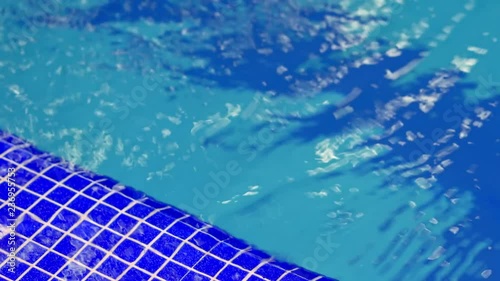 Background ripples and waves on the water in the sports pool