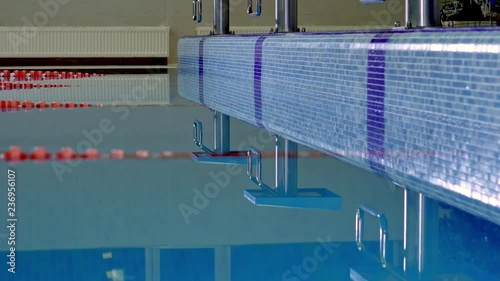 Background reflection in the water of a sports pool before the competition