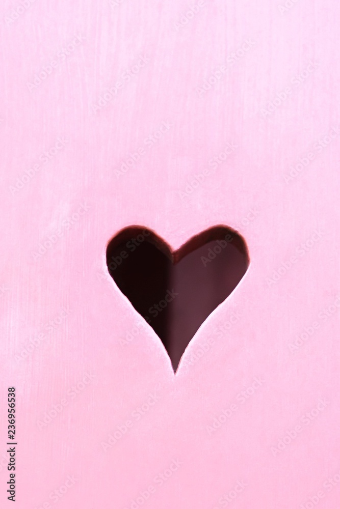 Valentines Day background. Wooden pink shutter with a hearts. Details. Copy space