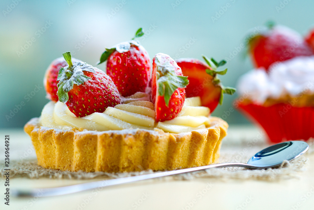 Tasty strawberry cake with whipped cream and with fresh strawberries. Pastry. Sweet dessert