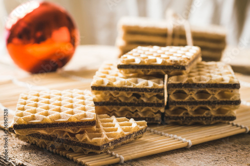 Delicious waffles on the festive wooden table