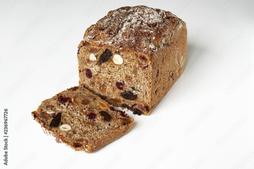whole-grain fruit and nut bread from Germany on white background whole-grain fruit and nut bread from Germany on white background