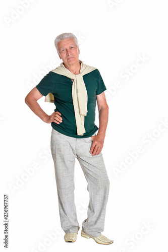 Portrait of senior man posing on white background