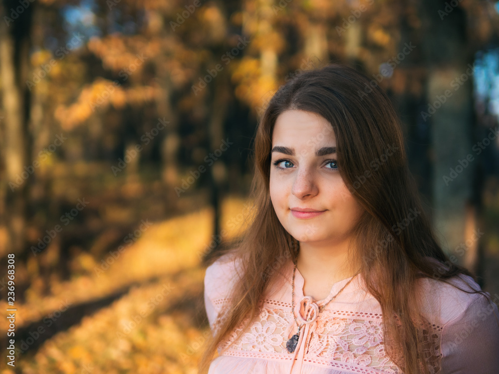 Portrait of a cute girl at sunset in the Park Portrait of a cute girl at sunset in the Park