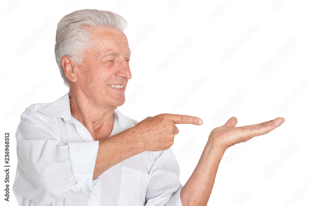 Successful senior man in white shirt posing 