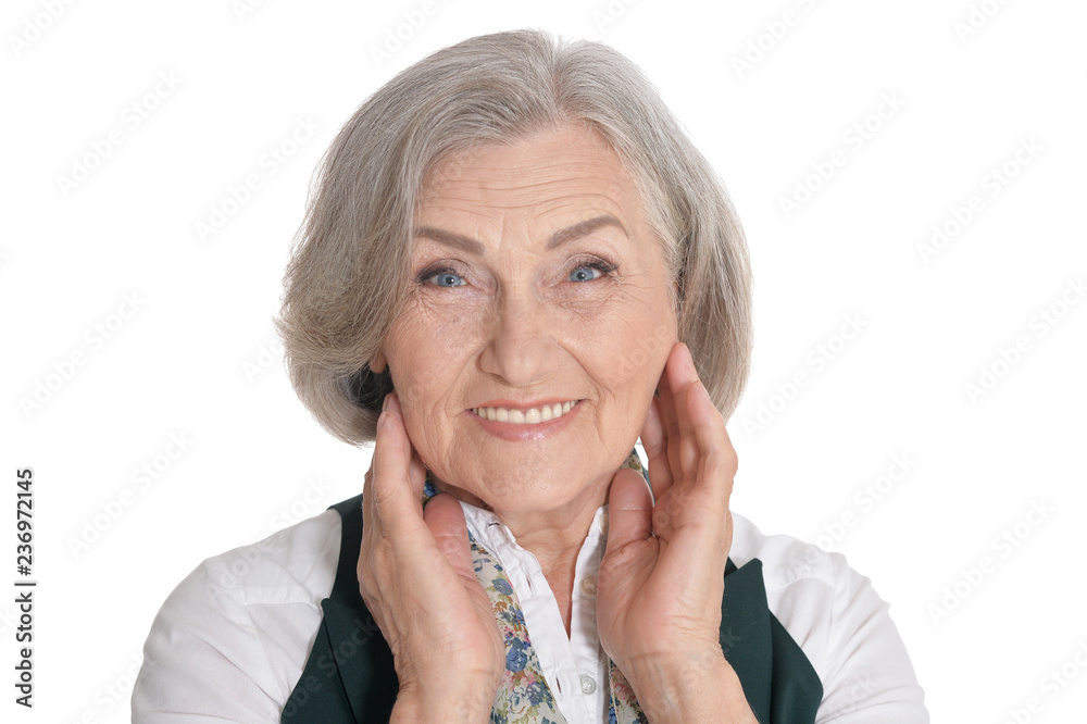 Beautiful senior woman, posing against white background