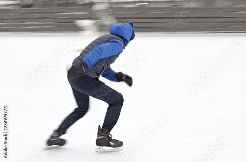 Canvas Print Skating on the ice rink.