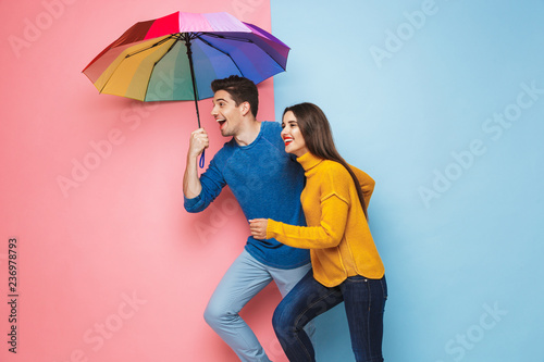 Cheerful young couple standing photo