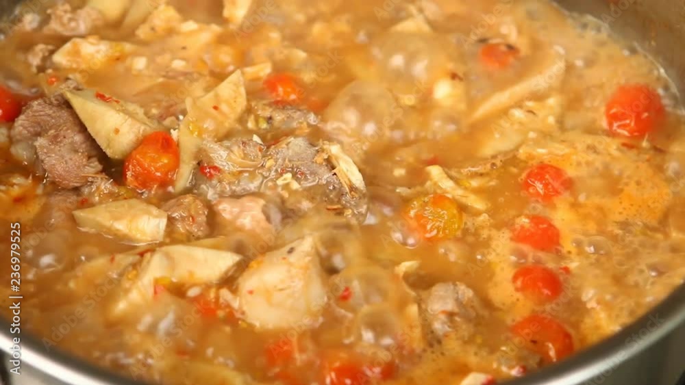 Cooking young jackfruit curry in pot, Thai food
Cooking young jackfruit curry in pot, Thai food