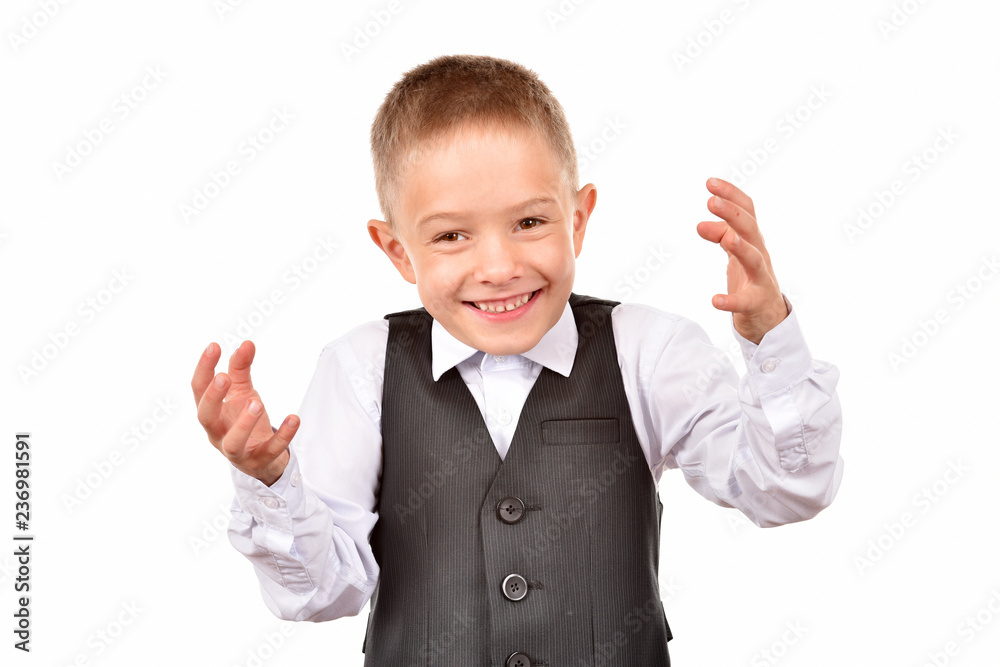 Boy in a suit on a white background. Happy childhood. Young businessman. Boy in a suit on a white background. Happy childhood. Young businessman.