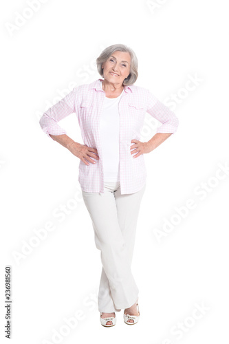 Happy senior woman posing on white background