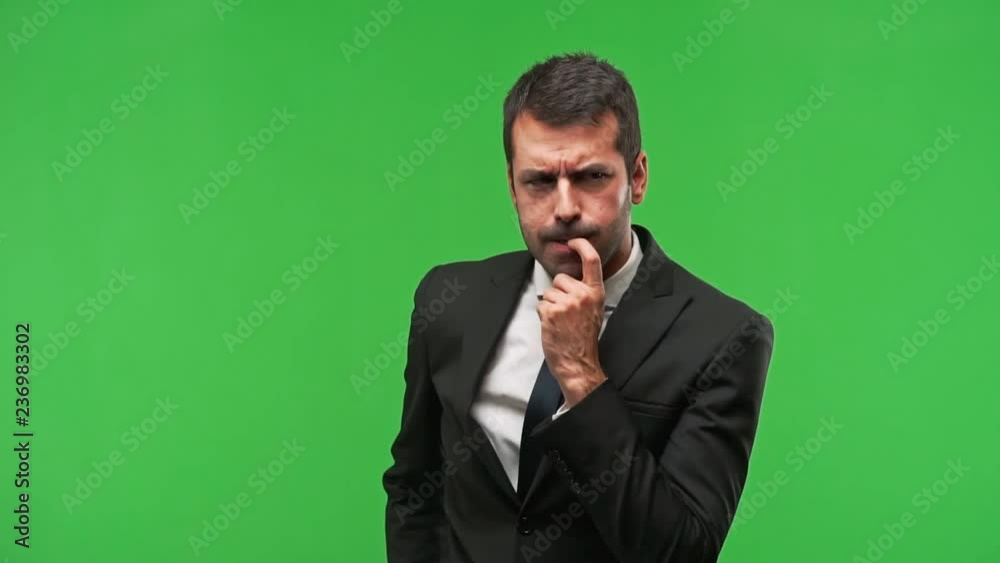 business man having doubts and questioning an idea business man having doubts and questioning an idea