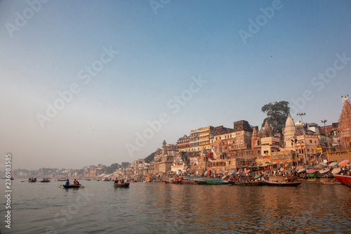 Varanasi India ancient city architecture panoramic view at sunset as seen from a boat on river Ganges