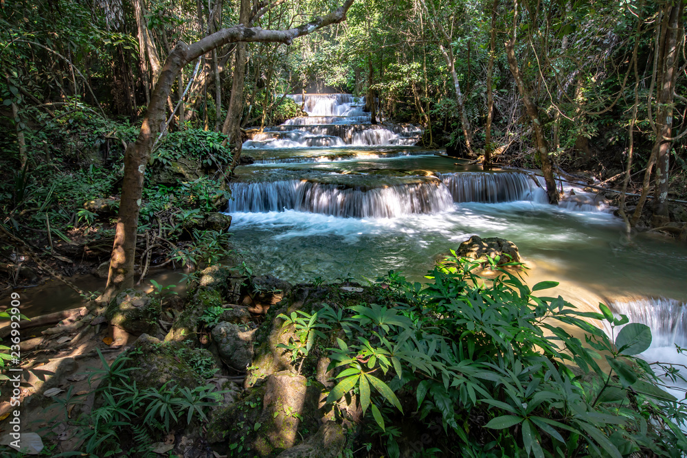 Naklejka premium Beautiful of Huai Mae Khamin waterfall at Kanchanaburi, Thailand with tree forest background. Waterfall Floor 1