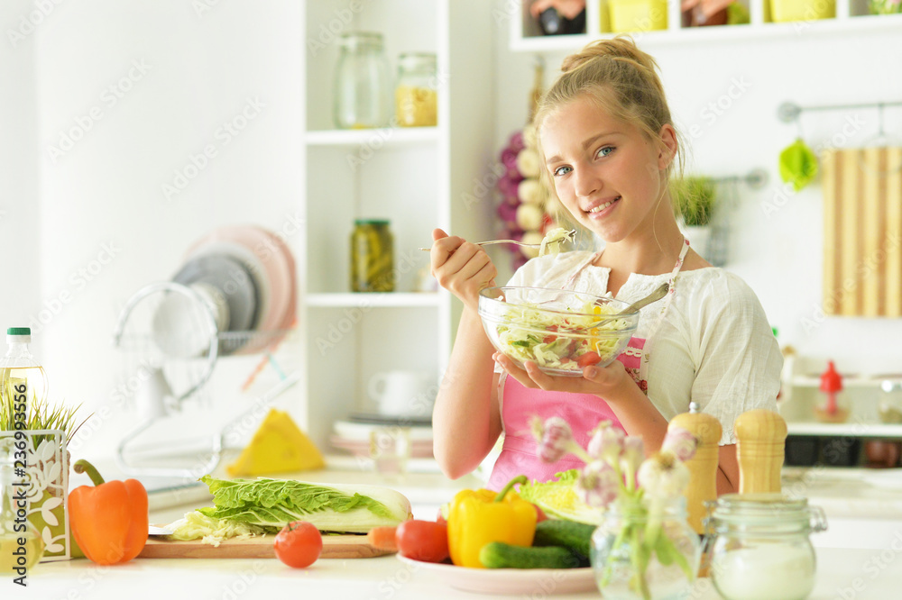 Portrait of girl in the kitchen preparing to eat Portrait of girl in the kitchen preparing to eat