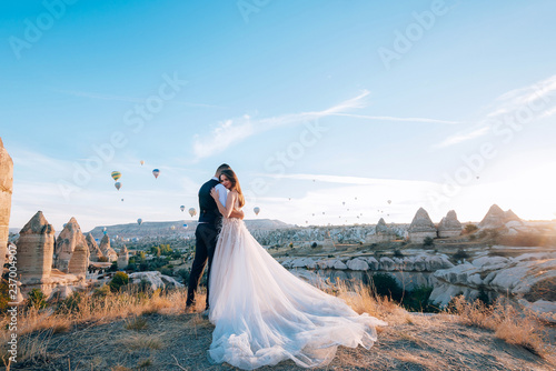 Obraz na płótnie Wedding in Cappadocia G?reme with a young married couple on the background of balloons. w salonie