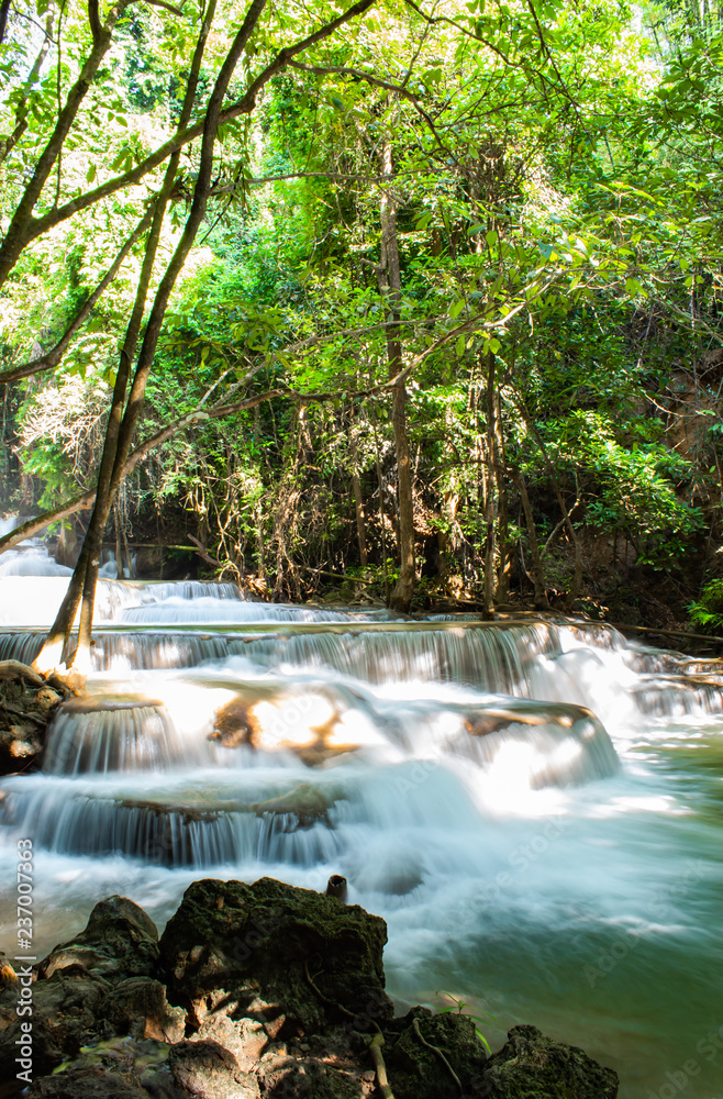 Waterfall flowing from the mountains at Huay Mae khamin waterfall National Park ,Kanchana buri in Thailand. Waterfall flowing from the mountains at Huay Mae khamin waterfall National Park ,Kanchana buri in Thailand.