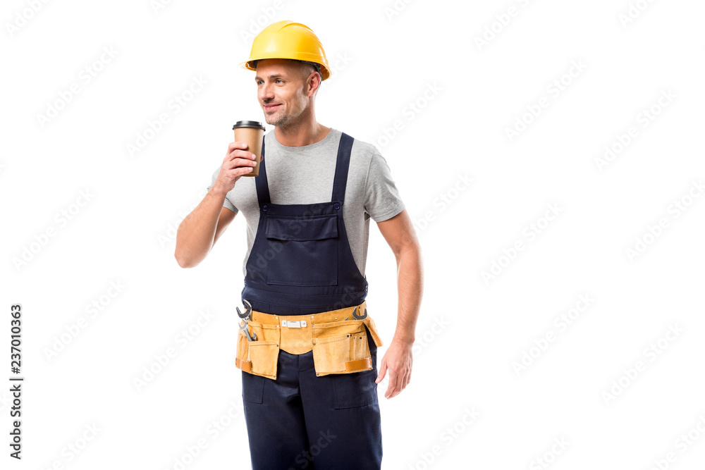 construction worker in helmet drinking coffee to go isolated on white