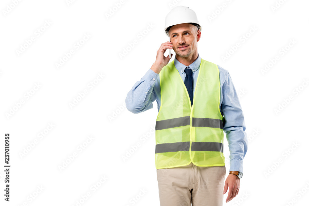 handsome engineer in helmet talking on smartphone isolated on white handsome engineer in helmet talking on smartphone isolated on white