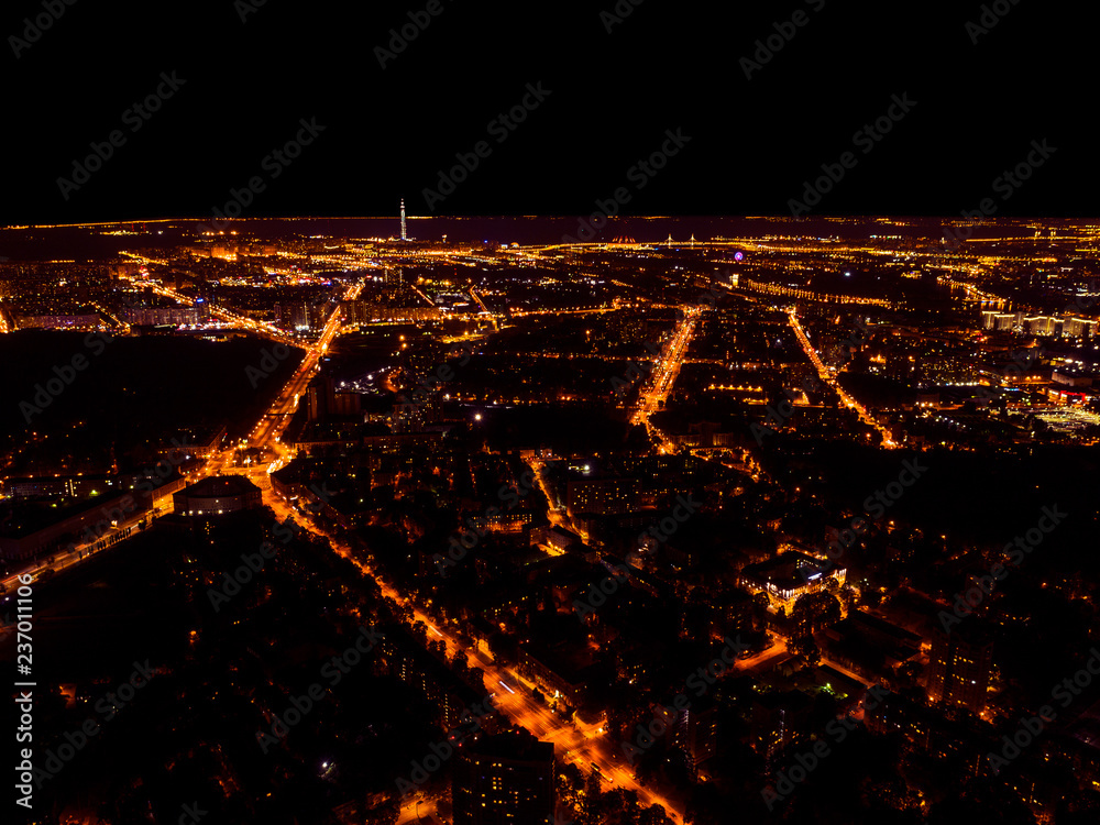 Aerial night view of a big city. Beautiful cityscape panorama at night. Aerial  view of buildings