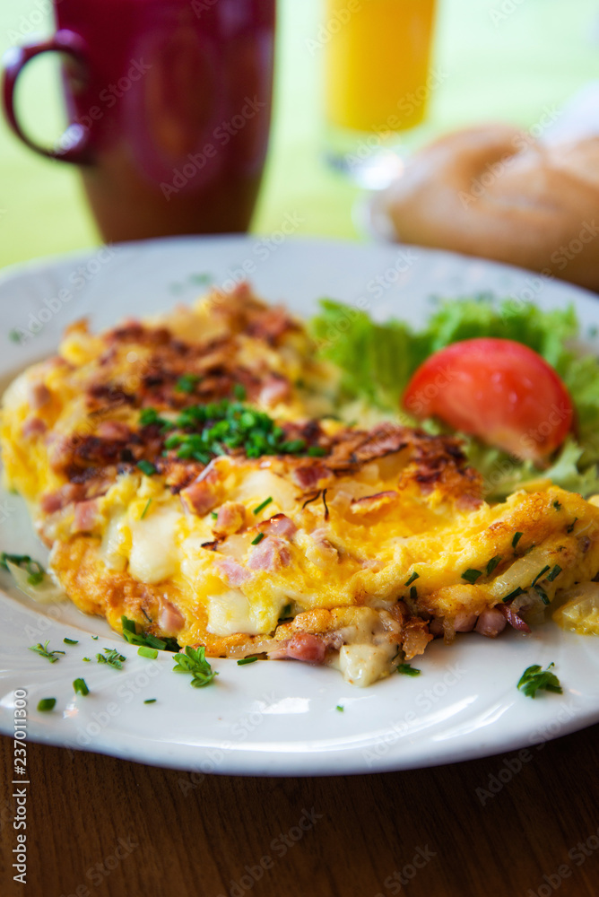 omelet with ham tomato and green salad omelet with ham tomato and green salad