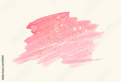 Abstract pink watercolor splash and golden glitter in vintage nostalgic colors.