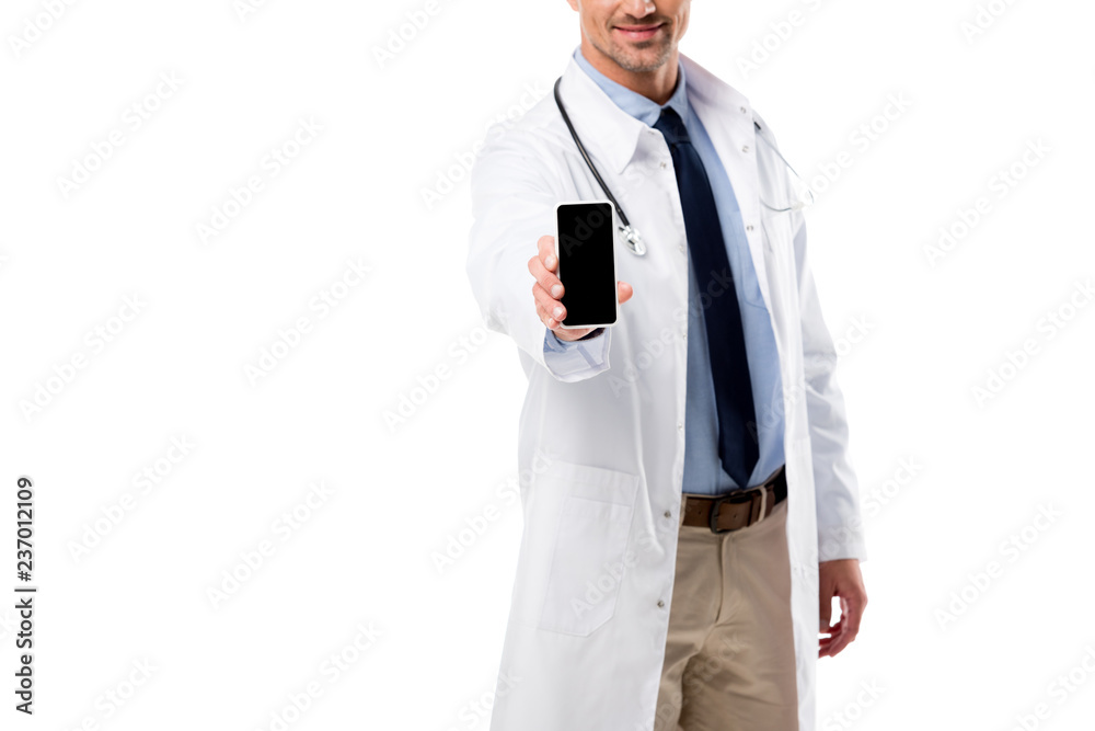 cropped view of doctor holding smartphone with blank screen isolated on white cropped view of doctor holding smartphone with blank screen isolated on white