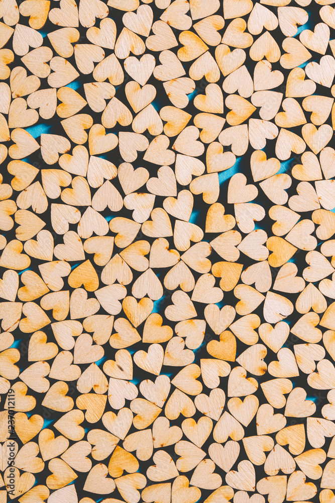 Little wooden hearts on blue background. Little wooden hearts on blue background.