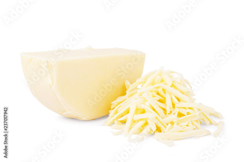 Whole and grated mozzarella on white background photo