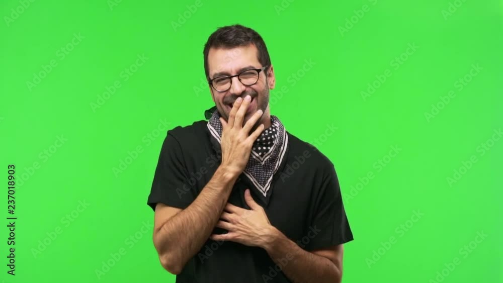 man pointing with finger at someone and laughing a lot on green screen chroma key background man pointing with finger at someone and laughing a lot on green screen chroma key background